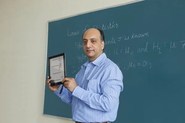 Teacher holding a digital tablet