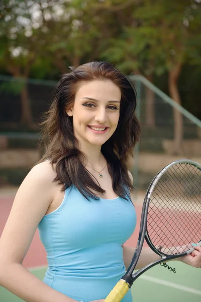 Woman tennis player practice in tennis court