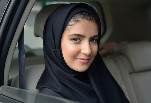 Emarati Arab Business woman in the car