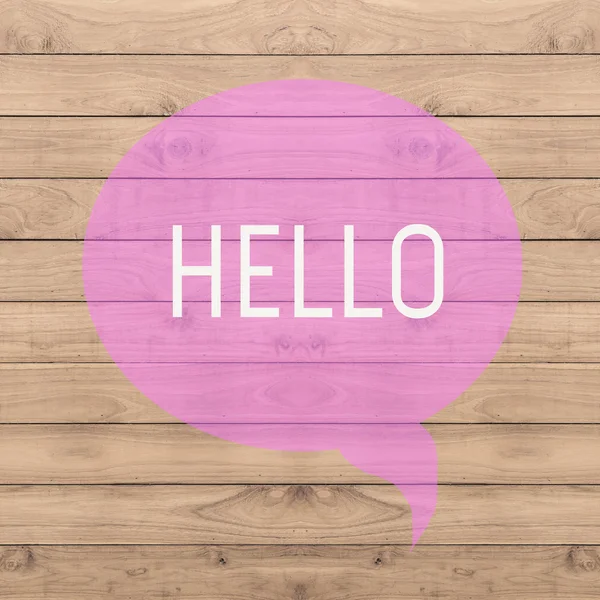 Hello greeting on pink quite wood background