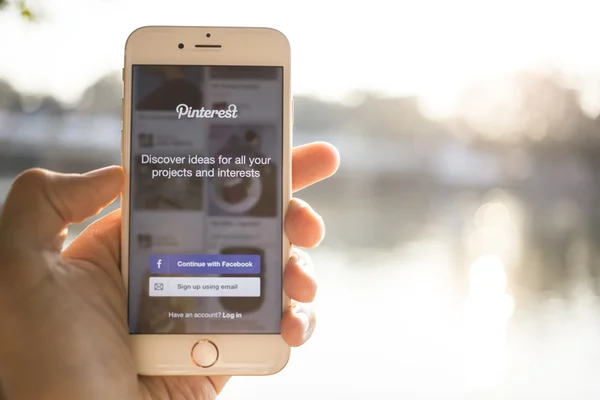 CHIANG MAI, THAILAND - JANUARY 04, 2015: Close-up shot of brand new Apple iphone 6,  with Pinterest application login on a screen.