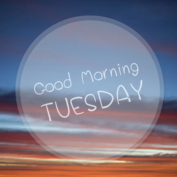 Good Morning Tuesday on sunrise sky blur background.