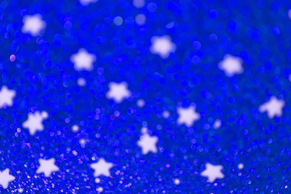 Festive Christmas background with stars.