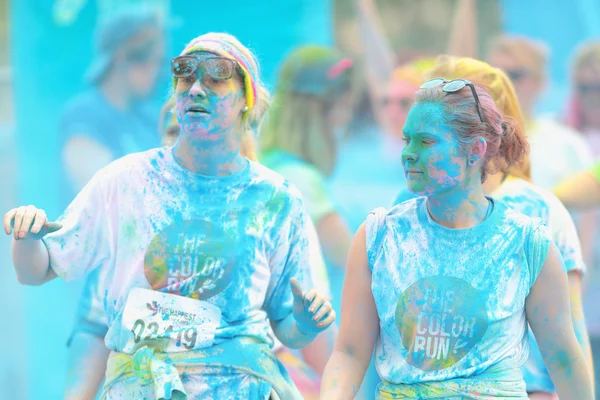 Runners at the last blue station at Color Run Tropicolor world t