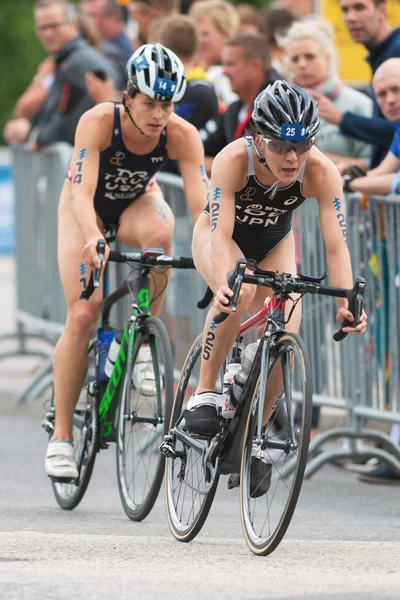 Juri Ide (JPN) infront of Sarah True (USA) in the cycling at the