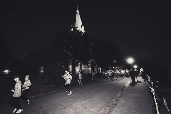 Runners at the Midnight run in Stockholm (Midnattsloppet)