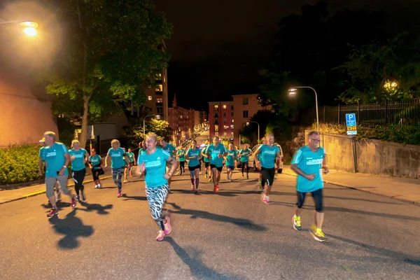 Runners at the Midnight run in Stockholm (Midnattsloppet)