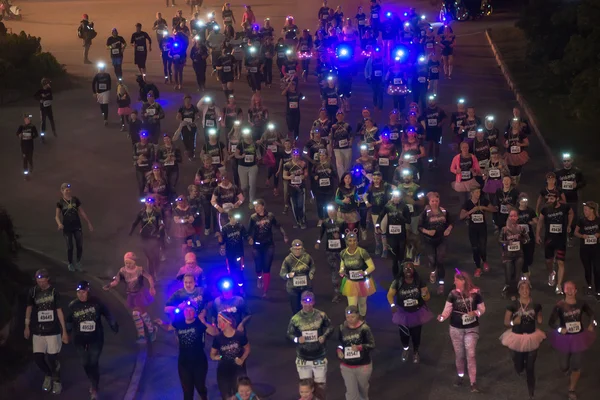 The first group of runners from above at the Color Run Night Edi