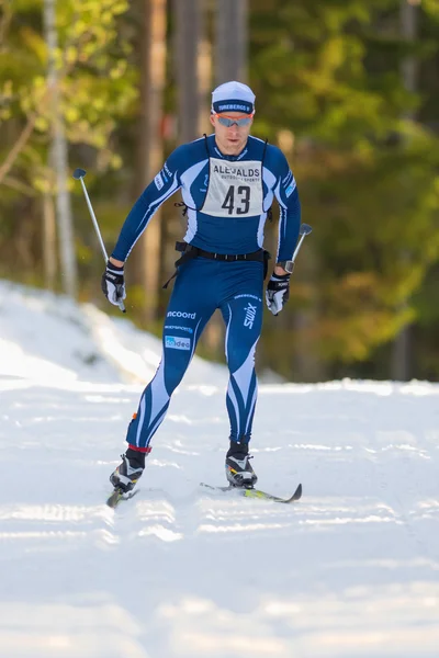 Closeup of a top ski runner after the first lap in the Stockholm