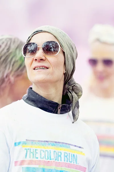 Woman looking up at Stockholm Color Run