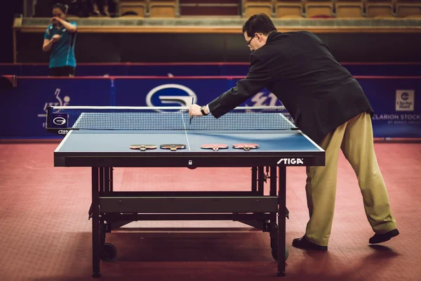 Referee checking at table tennis tournament SOC in the arena Eri