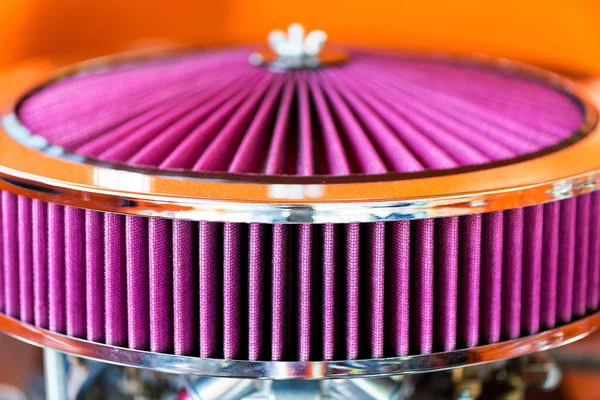 Purple air filter from a custom car in vivid colors
