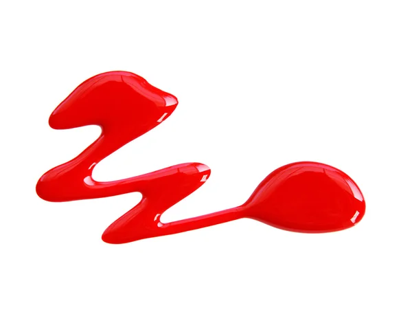 Red nail polish (enamel) drops sample, isolated on white