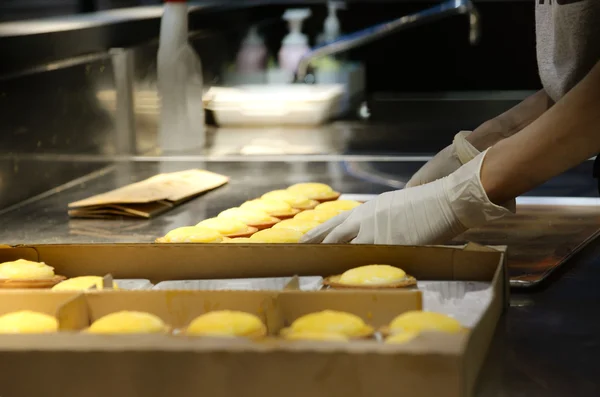 Hand making cheese tart