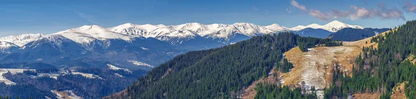 Landscape, spring snow-capped mountain range