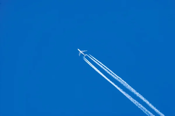 Background  of blue sky and jet-plane