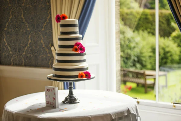 Classic wedding cake in natural window light