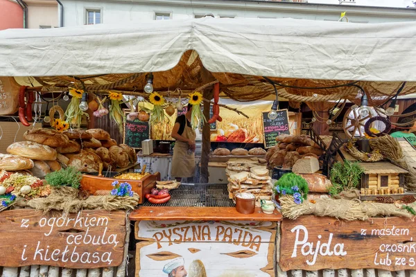 Sale of national products on the Main Market Square in Krakow.