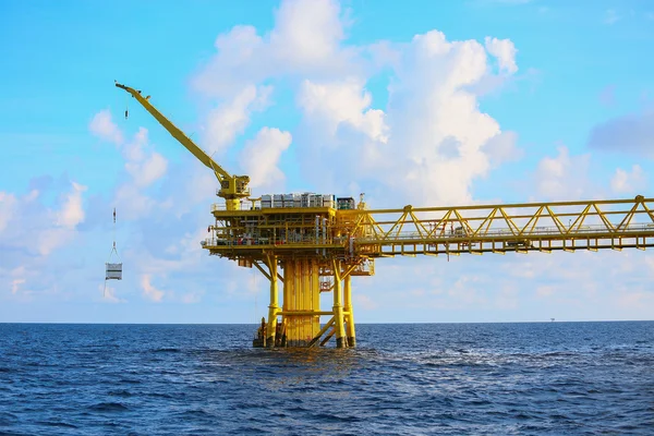 Offshore construction platform for production oil and gas, Oil and gas industry and hard work,Production platform and operation process by manual and auto function, oil and rig industry and operation