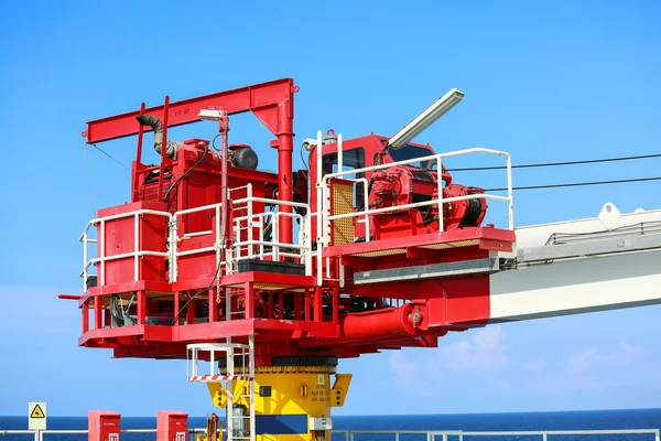 Crane construction on Oil and Rig platform for support heavy cargo, Transfer cargo or basket on work site, Heavy industry, heavy job on the oil and gas platform, Offshore operation on the platform.