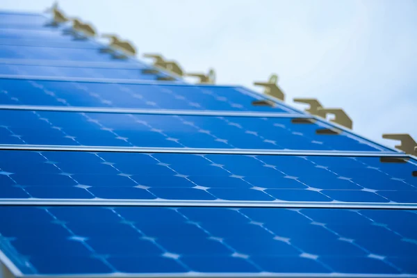 Solar Cell Generated Electrical Power by Sun Light, Closeup of Blue Photovoltaic Solar Panels, Green Energy for Safe World, Power Supply and Generated Electrical Power to Battery,