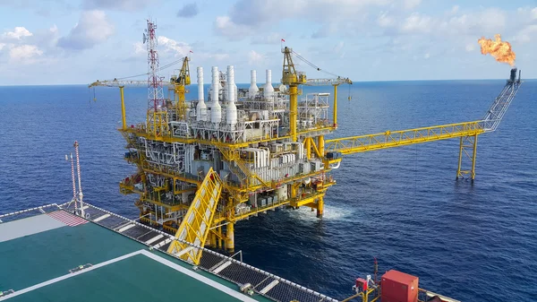 Offshore construction platform for production oil and gas, Oil and gas industry and hard work,Production platform and operation process by manual and auto function, oil and rig industry and operation