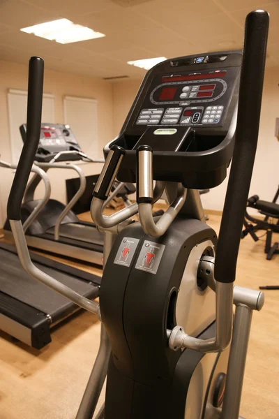 Room with gym equipment in the sport club, sport club gym , Health and recreation room