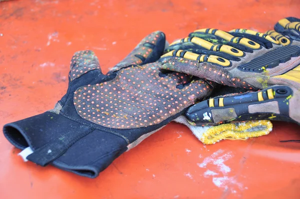 Old or dirty safety gloves on the works.
