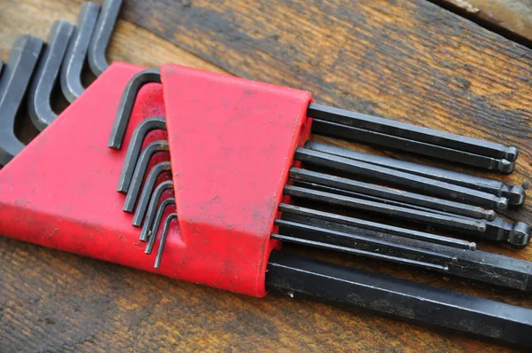 Hex set of hand tools on wooden background, Tools equipment