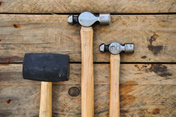 Hammer set of hand tools or basic tools on wooden background