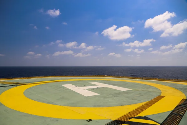 Helideck of oil and gas drilling rig in offshore industry, Helicopter landing area on construction platform in offshore of oil and gas industry or energy business for transfer passenger.