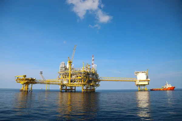Offshore oil and gas production and exploration business. Production oil and gas plant and main construction platform in the sea. Energy business.