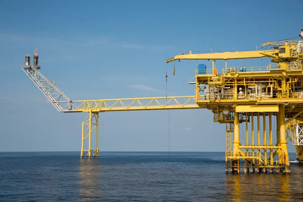 Offshore oil and gas production and exploration business. Production oil and gas plant and main construction platform in the sea. Energy business.