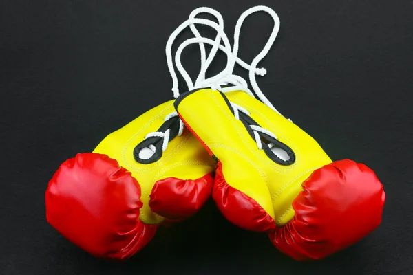 Red leather boxing gloves isolated , Boxing gloves background, popular sport for fighter.