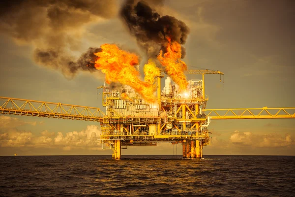 Offshore oil and gas fire case or emergency case, firefighter operation to control fire on oil and gas production platform, offshore worst case and can\'t control fire, man overboard.