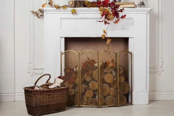 Artificial fireplace logs with white and gold bars