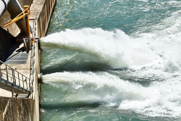Discharge water from dam in the Alps