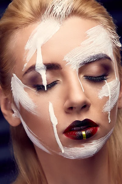 Fashion blonde model portrait with beautiful makeup