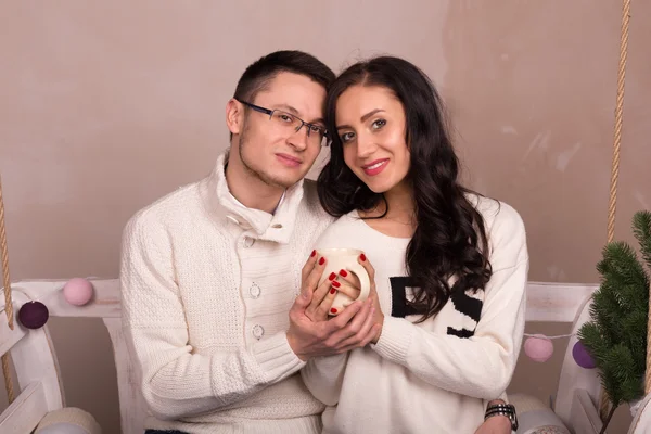 Portrait picture love couple with cup of hot cocoa