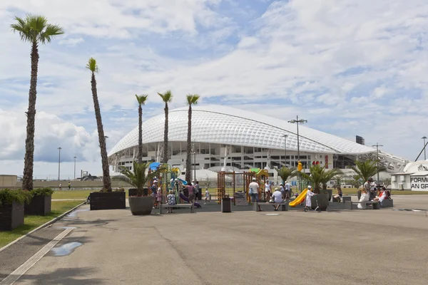 Playground in the Sochi Olympic Park against a background the Olympic Stadium \