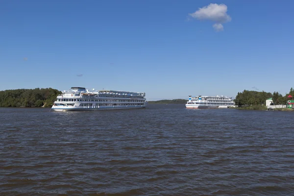 Cruise ship Maxim Litvinov goes according Sheksna river near the harbor in the village of Goritsy, Kirillov district Vologda region