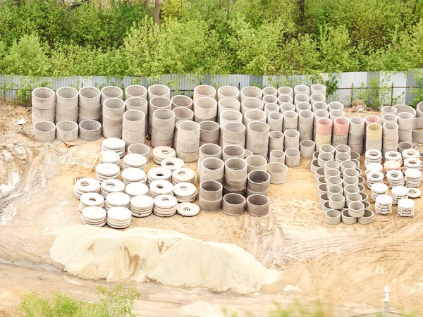 Stacks of concrete rings for sewer