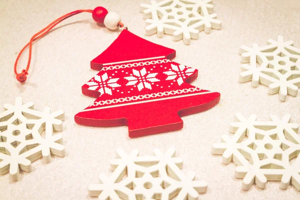 Christmas wooden ornaments toy with ribbon .