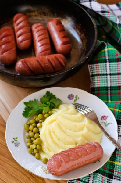 Grilled sausages and mashed potatoes