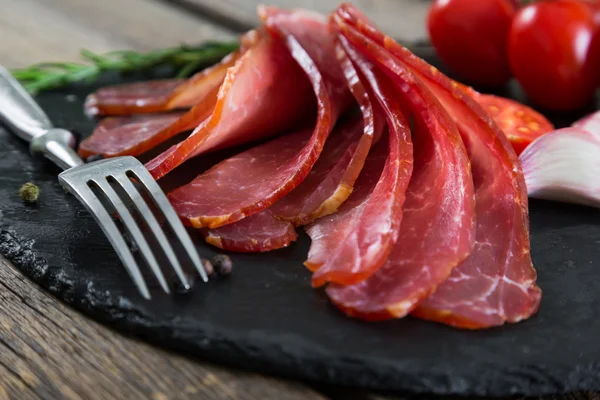 Slices of smoked beef