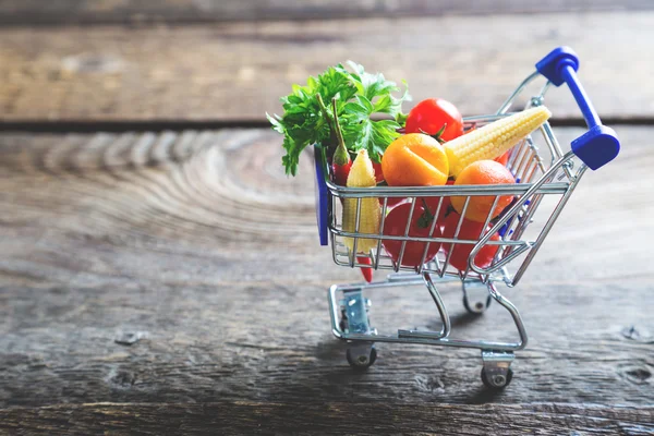 Shopping basket with fresh vegetables, healthy eating