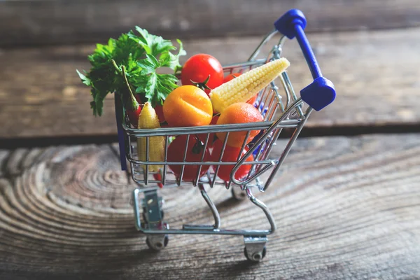 Shopping basket with fresh vegetables, healthy eating