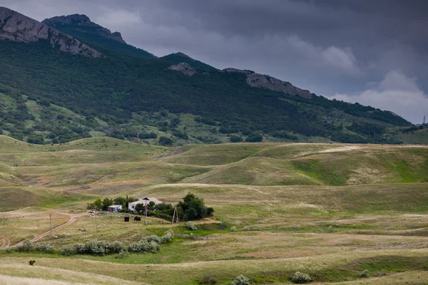 House in mountain valley