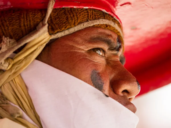 Korzok, INDIA - JUL 23: A monk performs a religious black hat ma