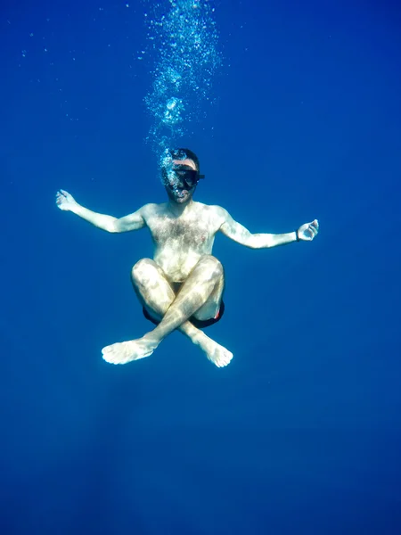 Underwater meditation man